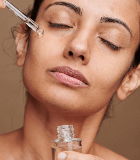 Basic skincare routine for ACNE applying medication image